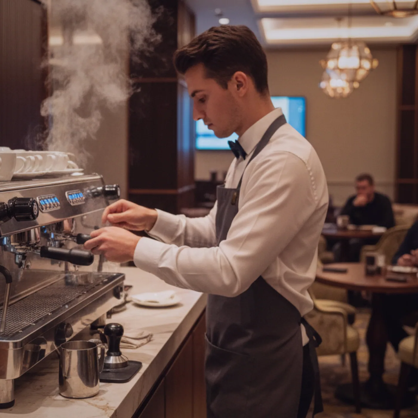 Tea poured for a table in the dining room before service
